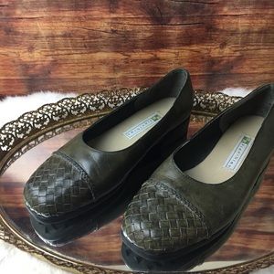 Dark green basket woven flats